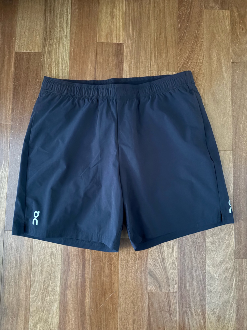 On Running Men’s Black Athletic Running Shorts with Reflective Logo
